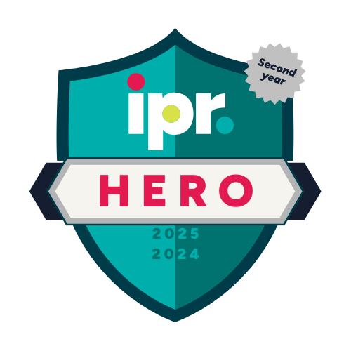 IPR Second Year Hero Badge, 2024 and 2025. Teal shield badge. 