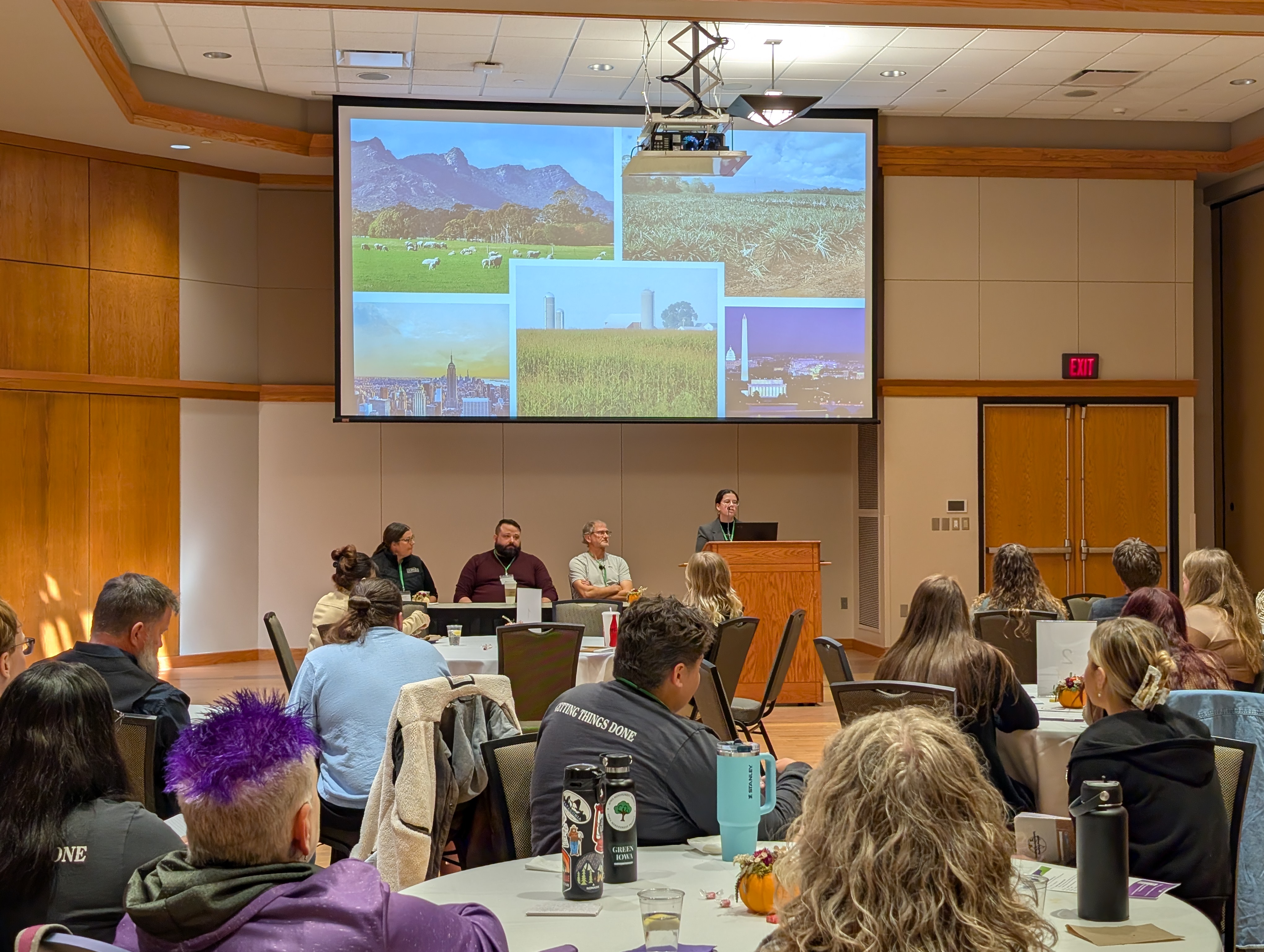 panel of guest speakers presenting to a group